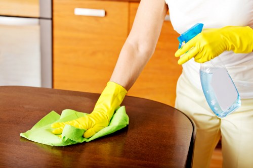 Stain removal from a sofa during upholstery cleaning in Soho